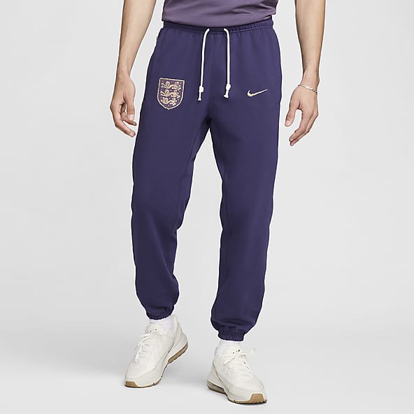 Hombre Morado Pantalones y mallas. Nike ES